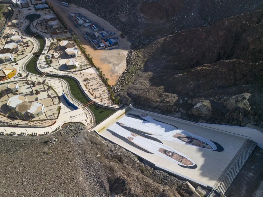 Aerial view of the marble portrait mosaic on Hatta Dam’s spillway